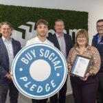 BAM pledges support for Scottish social enterprises Representatives from BAM with Buy Social Pledge logo