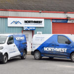 Northwest Roofing & Building Maintenance vans outside HQ