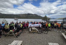 Charity cyclists at Loch Katrine