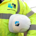 Henry Brothers strengthens Scottish presence with new Edinburgh base Construction worker with Henry Brothers branding