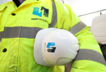 Henry Brothers strengthens Scottish presence with new Edinburgh base Construction worker with Henry Brothers branding