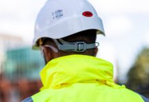 Tilbury Douglas grows order book to £1.7 billion in first half of 2026 Construction worker with Tilbury Douglas jacket