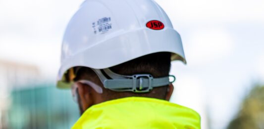 Tilbury Douglas grows order book to £1.7 billion in first half of 2026 Construction worker with Tilbury Douglas jacket